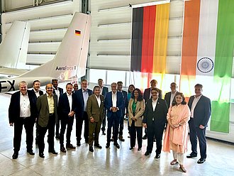 Group photo supervisiroy board of Dynamatics and Aerodata infront of the german und indian flag